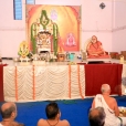 Dhuli Pada Puja being performed by Sri Dharmaraja Iyer, the President of the Sammoham