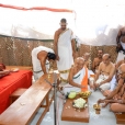 Sri Brahmananda Saraswati performing Pada Puja