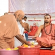 Sri Brahmananda Saraswati making an offering