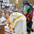 Dhuli Pada Puja being performed by Sri Nataraja Iyer, President of the Samooham