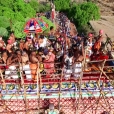 Sri Sannidhanam performing the Kumbhabhisheka atop the Rajagopuram