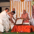 A citation in Kannada (binnavattale) was read out and offered to the Ubhaya Jagadgurus.