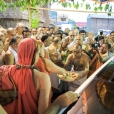 Devotees reverentially receiving the Jagadgurus at the entrance of the Poovananathar temple
