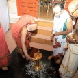 Jagadgurus lighting the first deepam of the Shasta Sahasra Deepa Prabhamark to mark the official commencement of the preparations of the Mahakumbhabhisheka of the Tamil Mahaganapati Balasubrahmanya temple and the Kirata Murti temple