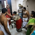 Sri Sannidhanam giving prasadam to  Rani Smt. R.P.K. Rajeswari Nachiyar of the Ramanathapuram Samsthanam