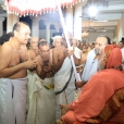 The titular Maharaja of Travancore, Sri Moolam Thirunal Rama Varma, welcoming the Jagadguru as State Guest by offering the Venkotta Kuda or Shweta Chatra, an official honour from the Kerala State Government